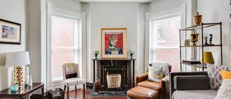 Living room with trundle bed and smart TV