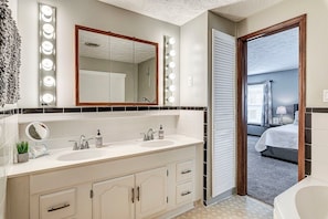 Primary bathroom with tub/shower combo
