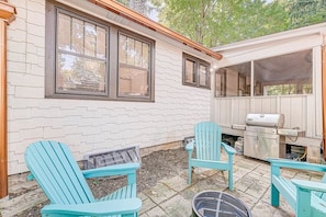 Patio with firepit, grill and 4 Adirondack chairs