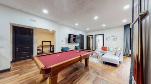 Welcome to our living room, where comfort meets entertainment!