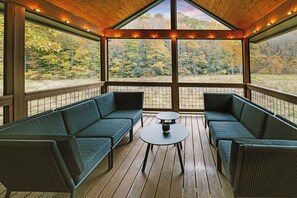 You'll hear sounds of the creek on the property while relaxing here