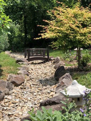 Three beds of Japanese gardens evolving every year.