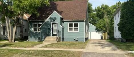 Front with large driveway