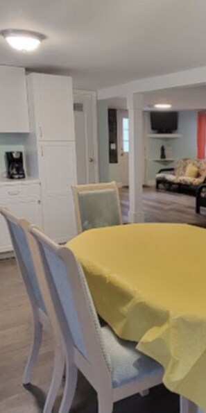 Kitchen large table with extra leaf, cans seat, 10 to 12 guest