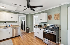 Kitchen equipped with all your main cooking essentials
Bathroom straight ahead  