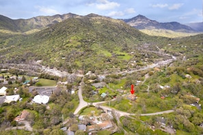 Located at the red arrow, between the Kaweah River and Skyline Trail