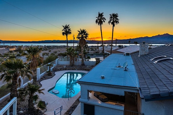 Aerial view of the house that shows the pool area