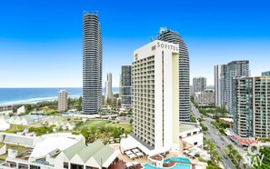 Balcony features glittering ocean and city views