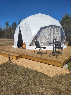 4-season dome on private land. Deck seating for outdoor dining experience.