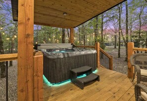 Soak your worries away under the stars in our tranquil outdoor hot tub, perfect for those crisp evenings!