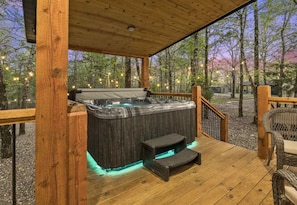Soak your worries away under the stars in our tranquil outdoor hot tub, perfect for those crisp evenings!