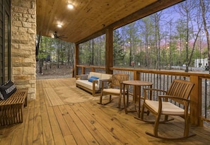 Unwind on the porch with your morning coffee, surrounded by the peaceful sounds of nature and a gentle breeze.