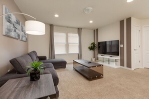 Cozy loft with Smart TV for relaxing moments.