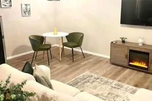Dining area with 2 person table. 
