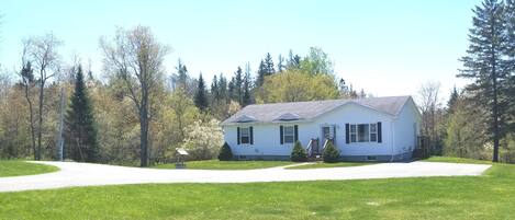 Home with large yard and plenty of parking for large vehicles or tow trailers!