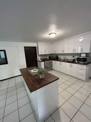 Kitchen island with space to prepare meals. 