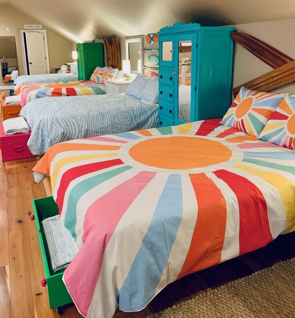 Loft: The happy decor, cheerful design and custom furniture are so fun  that the adults may be fighting over who gets to sleep here!  Have a huge crew?  Rent the other side too!  #104 & #102 are now both available to rent! 