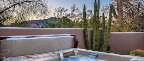 Surround yourself in nature while relaxing in the hot tub.