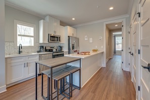 2nd Unit: Fully Equipped Kitchen stocked with basic cooking essentials and stainless-steel appliances.