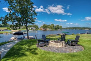 Fire Pit · Dock · Lake Floaties · Outdoor Chairs · Lake Access · Outdoor Patio · BBQ · Patio Set · Two Outdoor Balconies · GA Bulldog Cornhole Set · Outdoor Shower
