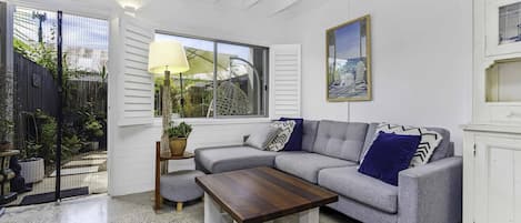 Living area with high ceilings