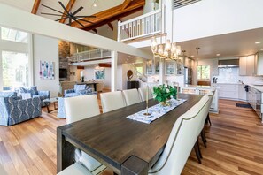 The dining room table has seating for up to 12 (and 2 more at the breakfast bar).
