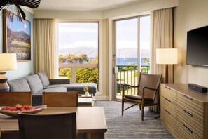 Separate living and dining areas. Couch converts to a sleeper sofa for two (Ocean View).