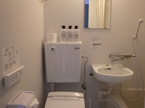 Unit bath facilities with toilet in each room