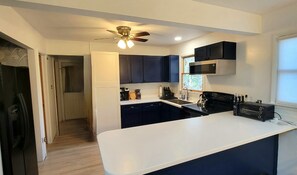 Remodeled Kitchen, huge pantry, coffee station.  Fully loaded kitchen!!