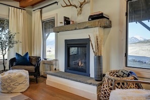 Cozy up around the gas fireplace on winter nights.