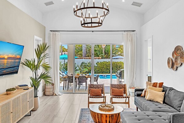 Unwind with a cup of coffee and a good book in this inviting Villa Bella Living room