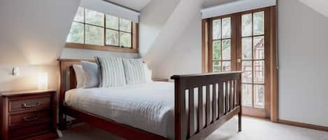 Beautiful queen bedroom with balcony access