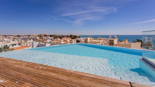 Our stunning rooftop swimming pool with panoramic views of the city. #algarve #pool #summer #airbnb