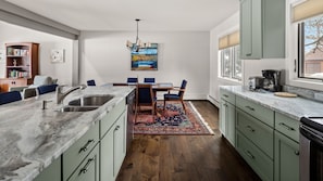 New Open kitchen looking into dining space