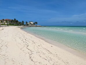 Gorgeous sandy beach with sparking crystal water ONLY 100 steps away!