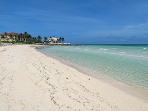 Gorgeous sandy beach with sparking crystal water ONLY 100 steps away!