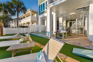 Furnished Pool Deck with Heated Pool and Outdoor Games