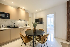 View of the kitchen and dining table