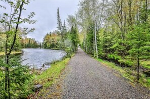 Your 540' private drive with lovely water views that leads to your lake home.