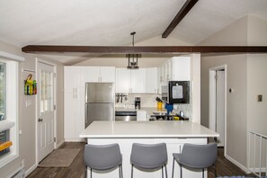 Fully stocked kitchen with coffee bar!