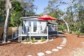 Front deck and large patio to the right to enjoy the sun and ocean breeze!