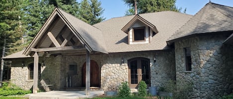 View from driveway - Beautiful Craftsman style home. Warm and inviting!