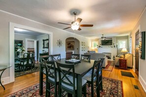 Enjoy you meals in this clean and well lighted dining area. Two dining tables are set up to accommodate more guests.
