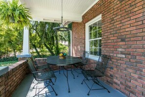 The front porch where you can enjoy fresh air and admire the view while relaxing or dining.