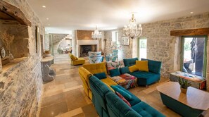 Spacious, bright living room - Large sofa - Fireplace - Large flat screen TV with Satellite + Canal+ subscription - Table football