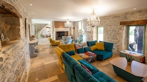 Spacious, bright living room - Large sofa - Fireplace - Large flat screen TV with Satellite + Canal+ subscription - Table football