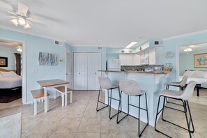 The counter bar provides additional seating for 4 and offers a chic and casual dining area perfect for enjoying quick meals or sipping drinks while socializing.