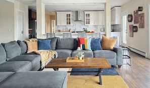 Open kitchen behind living room