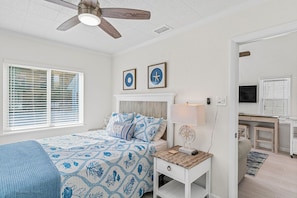 Queen bed and ceiling fan