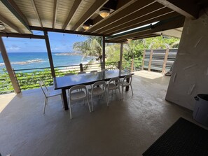 Seating for 10 on the granite outdoor table to dine, play games, visit, & relax.